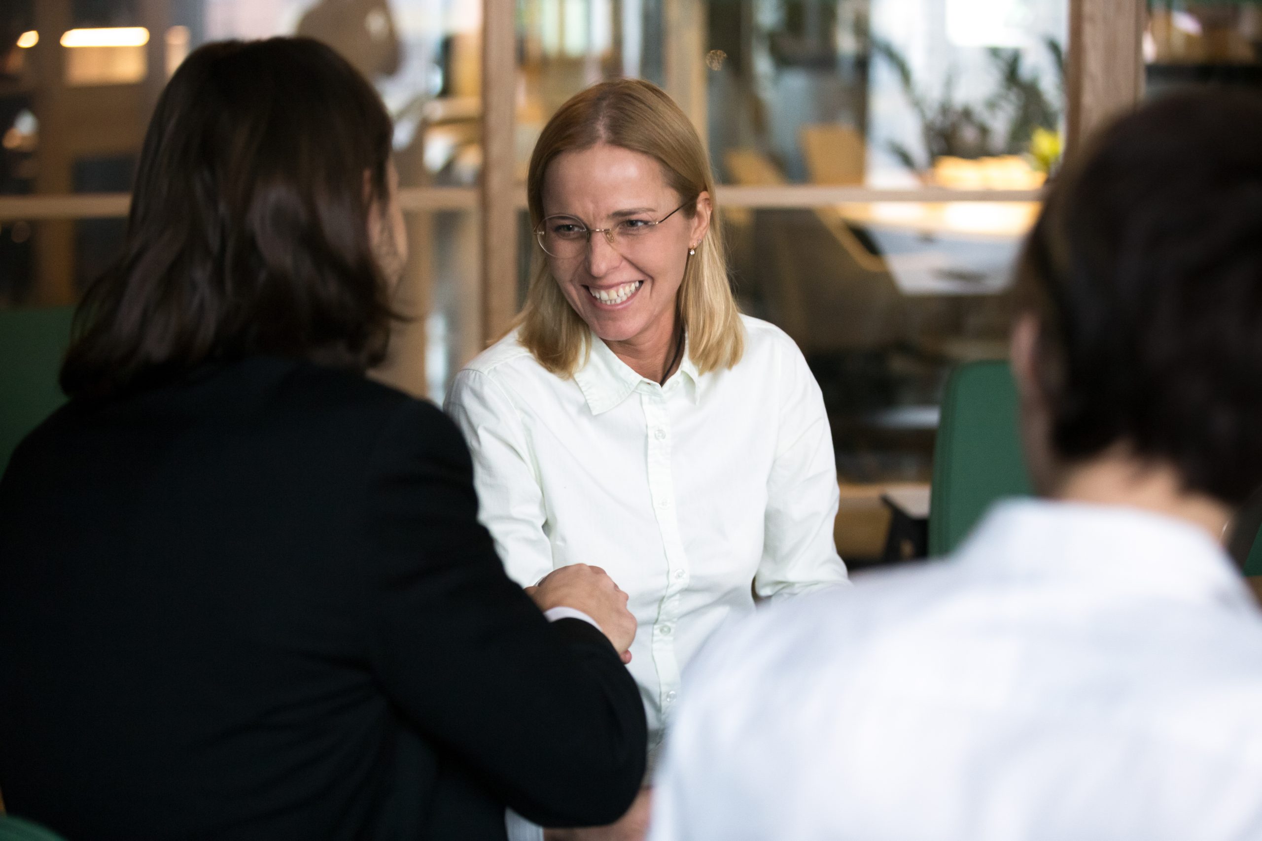 Employee and employer discussing proposed settlement agreement terms